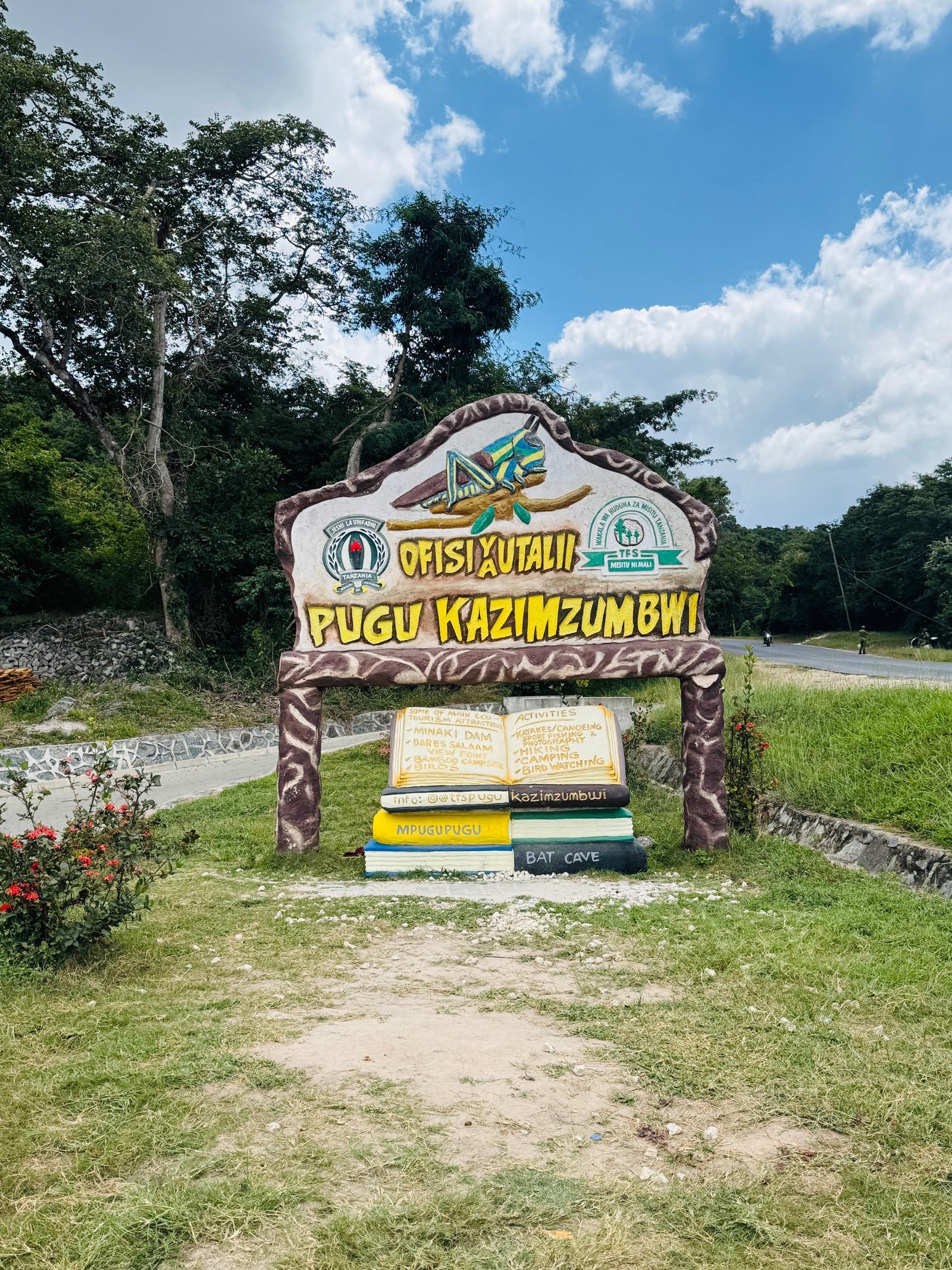 Roadside welcome sign for the Pugu Kazimzumbwi forest reserve tourism office